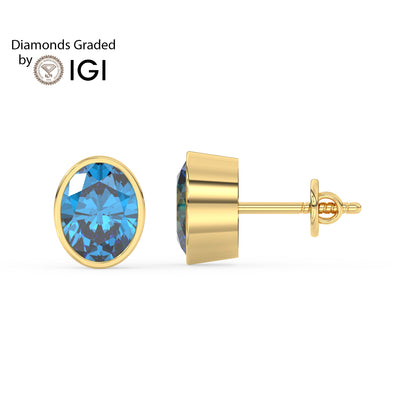 Rose gold earrings with blue gemstones on a white background, graded by IGI.