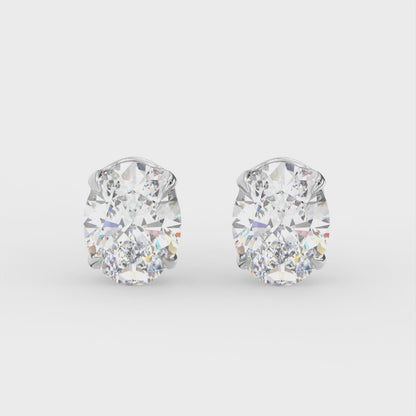 4ct Oval Lab Diamond Solitaire Stud Earrings - E/VVS 18K Gold